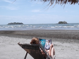 Enjoying reading People on the beach in Ometepe