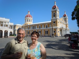 Me parents enjoying an iced coffee in Granada